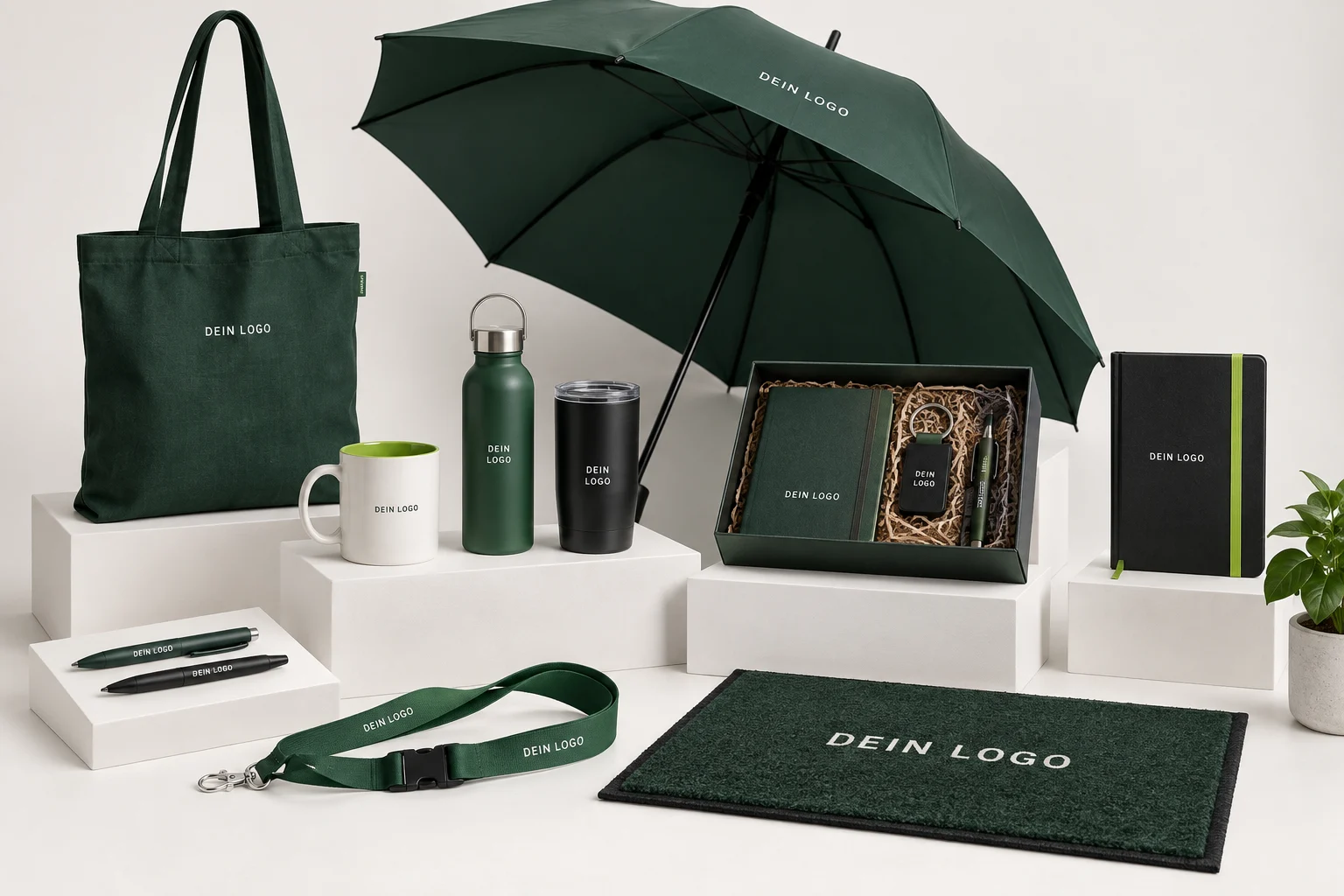 Werbeartikel mit Musterlogo: Tasse, Flasche, Thermobecher, Tasche, Stifte, Lanyard, Schirm, Notizbuch und Fußmatte